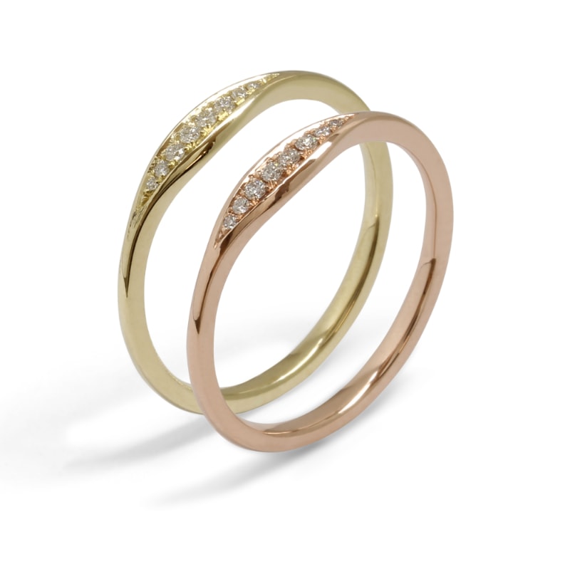 Gold ring with pavé set diamonds