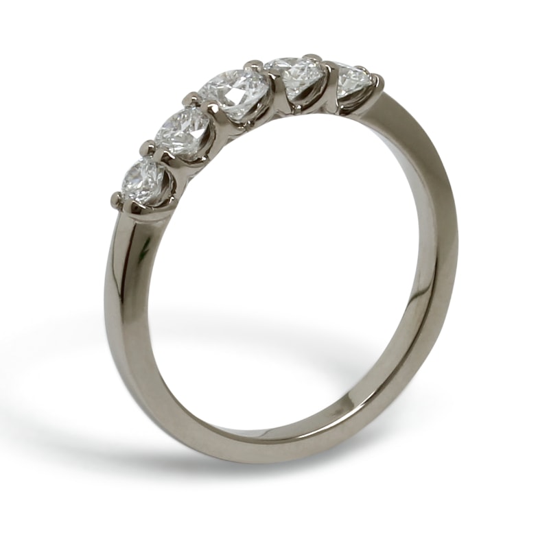 White gold ring set with five diamonds