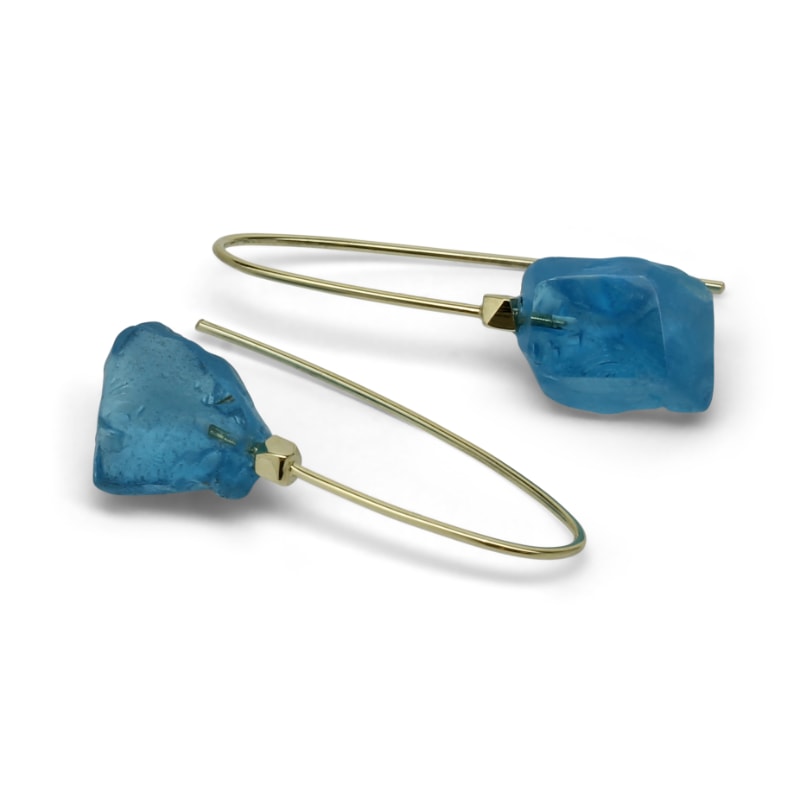 Yellow gold earrings with rough topaz